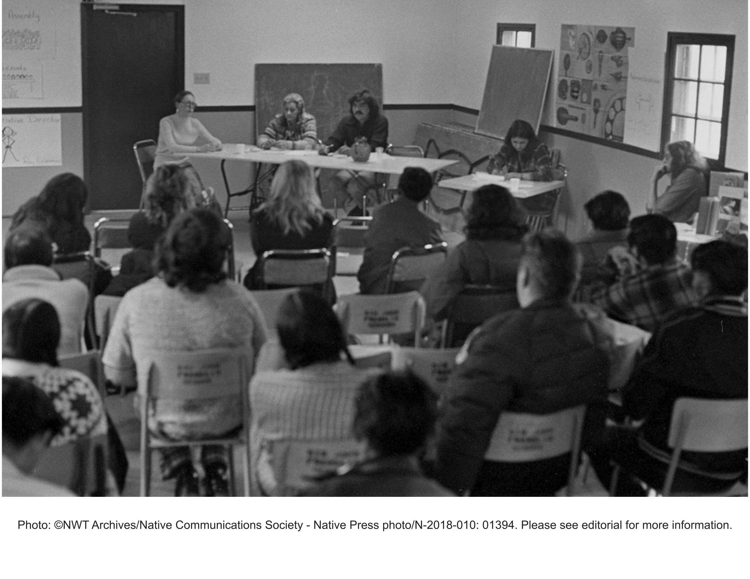 Cindy Erasmus explaining Tlicho (Dogrib) dictionary at Tree of Peace Annual General Assembly at Latham Island Community Centre in Yellowknife.